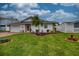Charming single-story home with well-manicured lawn, stone accents, and inviting curb appeal at 4048 Orient Dr, Hernando Beach, FL 34607