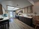 Galley kitchen with stainless steel appliances, ample counter space and light at 4048 Orient Dr, Hernando Beach, FL 34607