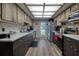 Modern kitchen with stainless steel appliances, light countertops and ample cabinet space at 4048 Orient Dr, Hernando Beach, FL 34607
