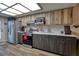 Well-lit kitchen featuring modern appliances and a view to the outside at 4048 Orient Dr, Hernando Beach, FL 34607