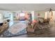 Bright living room with wood floors and access to the dining area at 4048 Orient Dr, Hernando Beach, FL 34607
