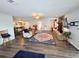 Bright and spacious living room with wood floors and an open-concept design at 4048 Orient Dr, Hernando Beach, FL 34607