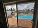 Backyard with an in-ground pool and waterway views perfect for relaxing at 4048 Orient Dr, Hernando Beach, FL 34607