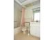 Bathroom featuring a shower/tub combo, toilet, and vanity with a mirror at 4707 Wallingford Ct # 4707, New Port Richey, FL 34655