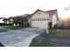 A cozy single-story home with a brick facade and a two-car garage at 4707 Wallingford Ct # 4707, New Port Richey, FL 34655