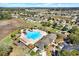 A beautiful aerial view of the community pool, clubhouse and playground at 548 Sea Holly Dr, Brooksville, FL 34604