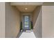 Inviting entryway featuring a glass-paneled front door and symmetrical potted plants for added curb appeal at 6555 Redbay Dr, Brooksville, FL 34602