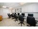 Shared computer room with multiple workstations and ergonomic chairs at 8110 Bismark Ct, Port Richey, FL 34668