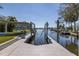 This waterfront home features a private boat lift for easy access to the water and canals at 8401 Carolyn Dr, Port Richey, FL 34668