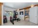 Bright gym features a full workout machine, and a large window providing plenty of natural light at 8401 Carolyn Dr, Port Richey, FL 34668