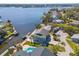 Beautiful waterfront home with a private dock, boat lift, and serene water views at 8408 Damen Ln, Port Richey, FL 34668