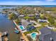 Beautiful waterfront home with a private dock, boat lift, and serene water views at 8408 Damen Ln, Port Richey, FL 34668