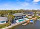 Beautiful waterfront home with a private pool and a boat dock, perfect for enjoying waterfront living at 8408 Damen Ln, Port Richey, FL 34668