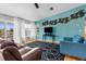 Bright living room with a waterfront view, comfortable seating and stylish decor at 8408 Damen Ln, Port Richey, FL 34668