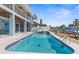 Gorgeous pool and spa overlooking the waterfront, complete with a private dock and boating access at 8408 Damen Ln, Port Richey, FL 34668