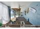 Bright sunroom overlooking the pool area, offering a serene indoor/outdoor living experience at 8408 Damen Ln, Port Richey, FL 34668