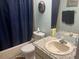 Functional bathroom with a shower-tub combo and vanity sink at 9374 Nakoma Way # 0009, Weeki Wachee, FL 34613