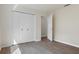 Bedroom with wood floors, and a closet at 9397 Merriweather Dr, Weeki Wachee, FL 34613