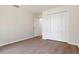 Bedroom featuring wood floors and a closet at 9397 Merriweather Dr, Weeki Wachee, FL 34613