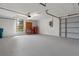 Spacious two car garage with room for a workshop or storage at 9397 Merriweather Dr, Weeki Wachee, FL 34613