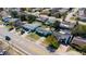 Neighborhood aerial view of a single-story home with mature trees and proximity to local amenities at 10245 Regency Park Blvd, Port Richey, FL 34668