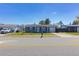 Charming single-story home with a well-manicured front yard and a private driveway at 10245 Regency Park Blvd, Port Richey, FL 34668
