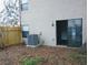 Outdoor patio and backyard featuring a sliding glass door for easy indoor-outdoor living at 12401 Joel Ct, Tampa, FL 33612