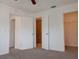 Bedroom with multiple closets and bathroom access at 12401 Joel Ct, Tampa, FL 33612