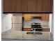 The kitchen boasts granite countertops and stainless steel appliances, perfect for modern cooking at 12401 Joel Ct, Tampa, FL 33612