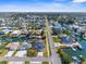 Beautiful waterfront community featuring a network of canals, boat docks, and single Gathering homes under a blue sky at 13726 Michelle Ave, Hudson, FL 34667