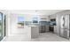 Bright open kitchen with new appliances and an island at 13726 Michelle Ave, Hudson, FL 34667