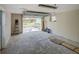 Spacious garage with an open door that offers access to the driveway and backyard at 14821 Sassandra Dr, Odessa, FL 33556