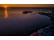 Breathtaking aerial shot of the waterfront at sunset at 1616 Sea Breeze Dr, Tarpon Springs, FL 34689