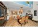 The dining room features a decorative chandelier, adjacent to the kitchen with an open layout at 1616 Sea Breeze Dr, Tarpon Springs, FL 34689
