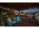 Charming dock gazebo with cozy seating, providing an inviting outdoor space for relaxation and entertainment at 1616 Sea Breeze Dr, Tarpon Springs, FL 34689