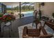 Outdoor patio and screened-in pool offers beautiful landscaping and relaxing space at 1616 Sea Breeze Dr, Tarpon Springs, FL 34689