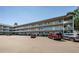 Condo building featuring multiple stories, balconies, and convenient parking spaces at 2261 Swedish Dr # 33&35, Clearwater, FL 33763