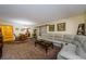 Spacious living room features a large sectional sofa and sliding barn doors at 2261 Swedish Dr # 33&35, Clearwater, FL 33763