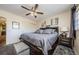 Cozy main bedroom with a large bed, ceiling fan, and neutral decor at 2261 Swedish Dr # 33&35, Clearwater, FL 33763