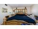 Ornate main bedroom with intricate wood detailing and natural light at 2261 Swedish Dr # 33&35, Clearwater, FL 33763