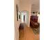 Spacious hallway flowing into the living area, showcasing the home's open layout at 2931 Walnut Grove Ct, Holiday, FL 34691