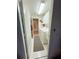 Convenient laundry room with washer, dryer, built-in cabinets, and tile floors at 2931 Walnut Grove Ct, Holiday, FL 34691