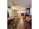 Open-concept living room seamlessly connects to the kitchen and dining area at 2931 Walnut Grove Ct, Holiday, FL 34691
