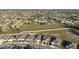 Spacious neighborhood with single Gathering homes, many with two car garages, green lawns and mature landscaping at 3667 Autumn Amber Dr, Spring Hill, FL 34609