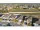 Panoramic aerial view of a residential area featuring homes with neatly maintained lawns at 3667 Autumn Amber Dr, Spring Hill, FL 34609