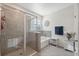 Bathroom featuring a tiled shower, separate tub, and stylish decor, providing a relaxing atmosphere at 3667 Autumn Amber Dr, Spring Hill, FL 34609
