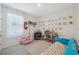 bedroom with a collection of books and wall art at 3667 Autumn Amber Dr, Spring Hill, FL 34609