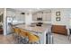 Bright and spacious kitchen featuring stainless steel appliances, granite countertops, and island seating at 3667 Autumn Amber Dr, Spring Hill, FL 34609