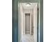 Hallway with gray paint and white marble like floors at 4009 N Seminole Ave, Tampa, FL 33603