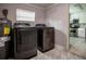 Convenient laundry room with modern washer and dryer units and ample space at 4009 N Seminole Ave, Tampa, FL 33603
